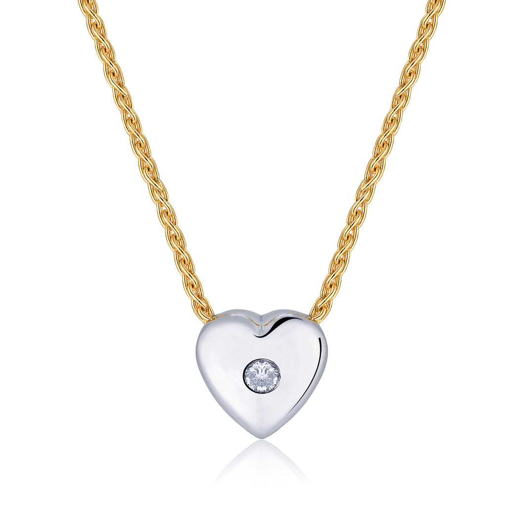 AMOUR FOU · 18k White Gold Heart-Shaped Solitaire Slider Pendant on a 16 inch (42cm) 18k Yellow Gold Wheat Link Chain. Pendant  is set with One  Round Brilliant Cut Natural Diamond.