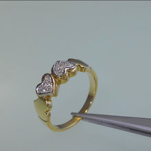 Load and play video in Gallery viewer, 18k Yellow and White Gold Heart-Shaped Designer Ring pavé-set with 12 Round Brilliant Cut Natural Diamonds
